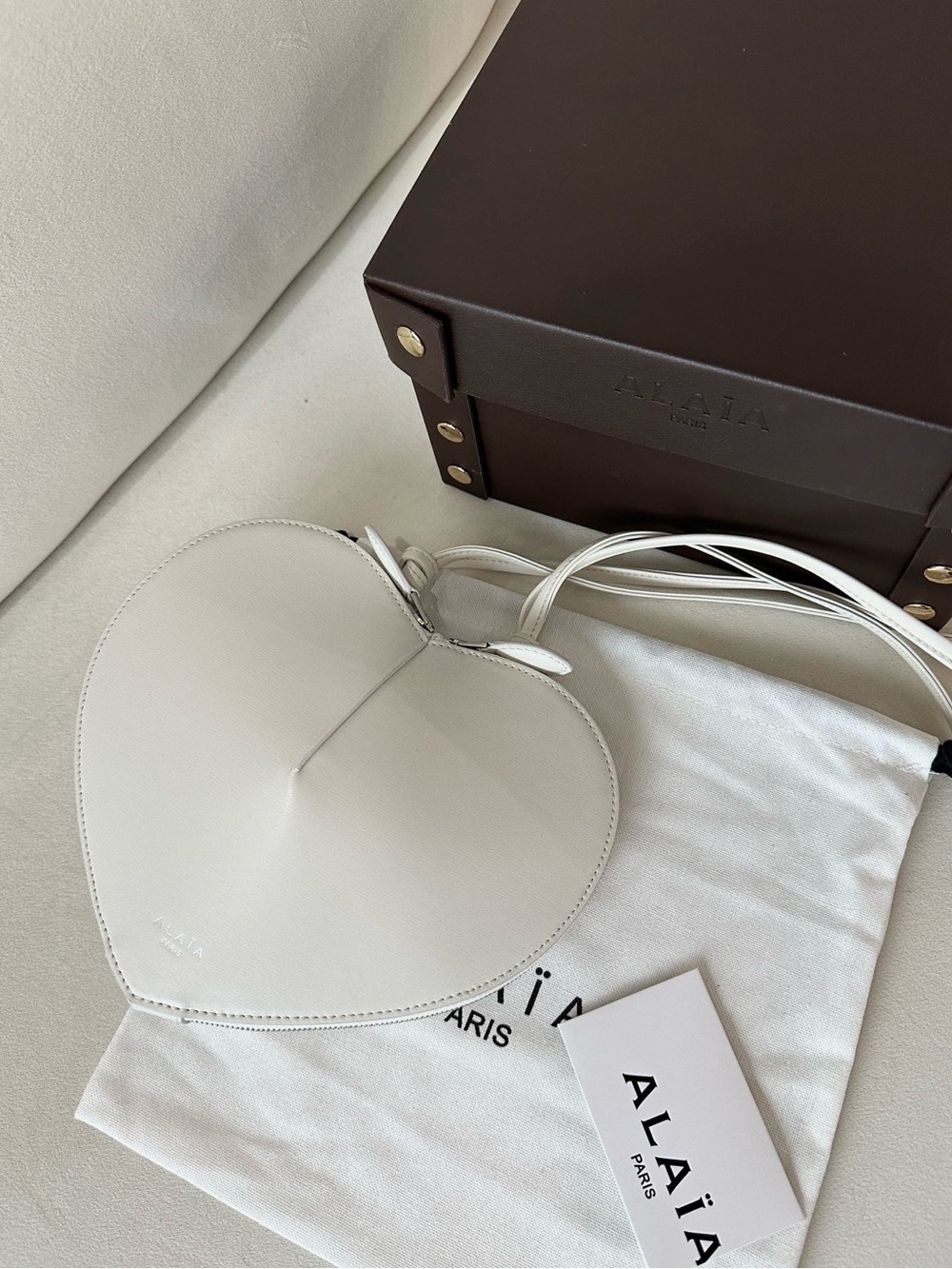 Alaïa White Heart-Shaped Crossbody Bag